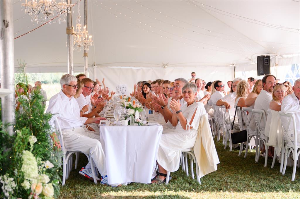 seated long table dinner guests